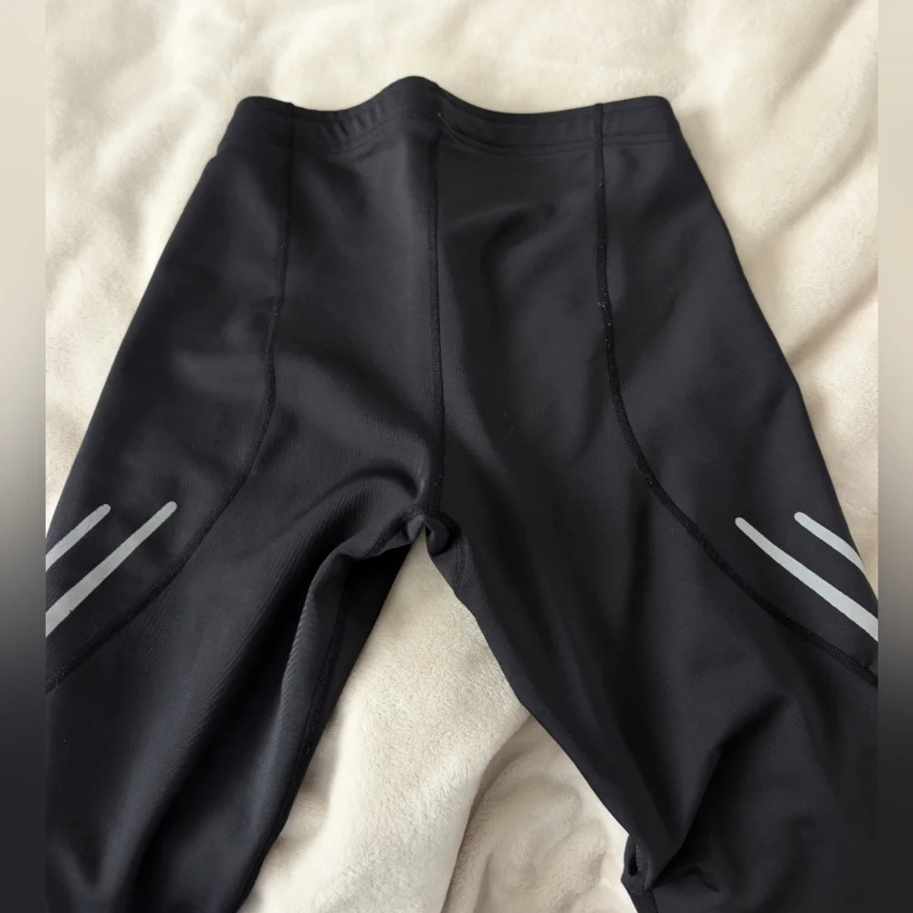 SUGOI Black Reflective Trim Thermal Leggings - Picture 7 of 7